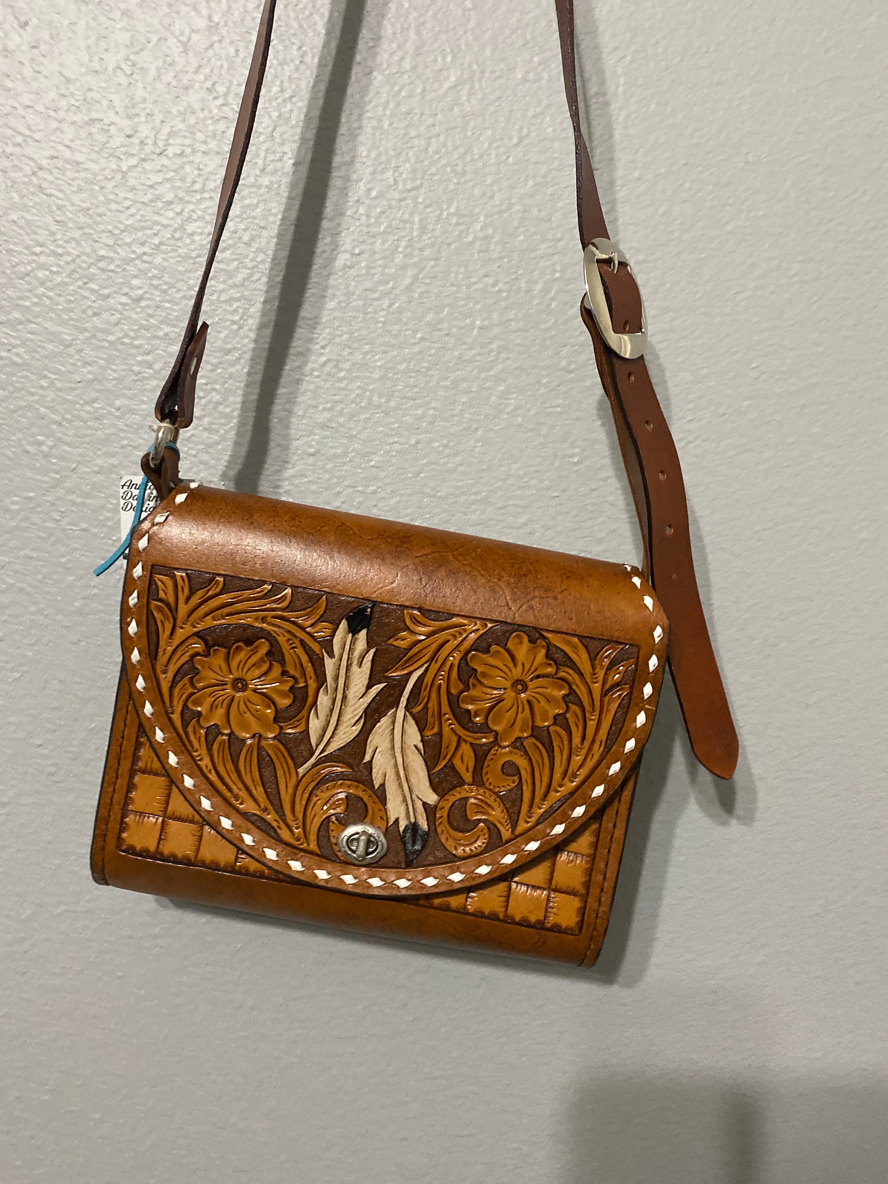 Leather feather tooled purse